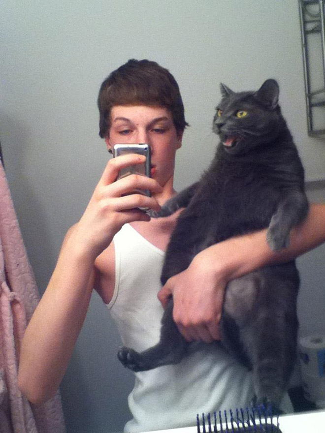 Weirdest selfie with a cat ever.