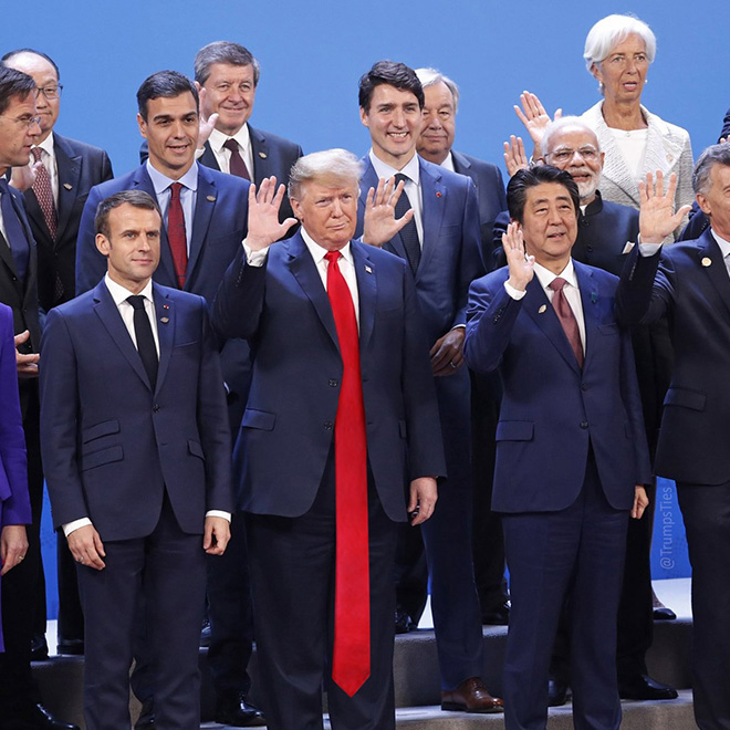 Trump posing with pals in his favorite red tie.