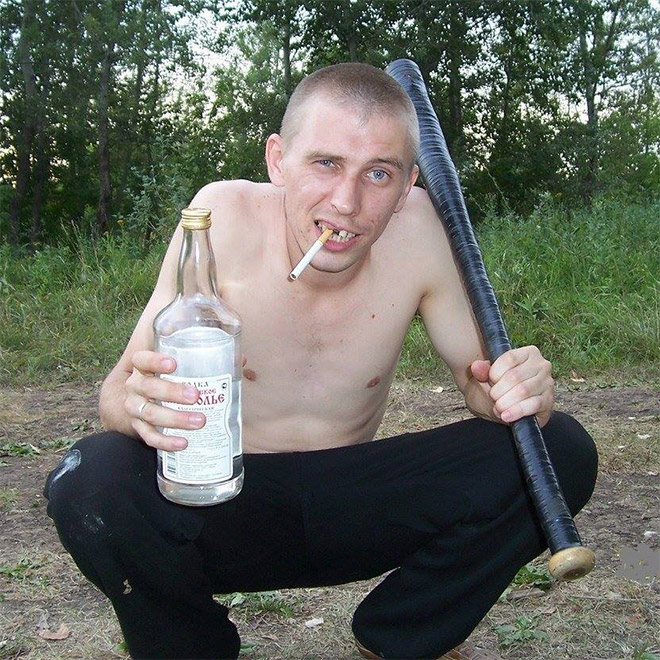 Squatting slav in a tracksuit.