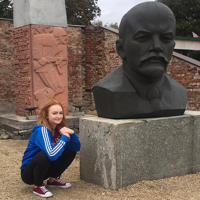 Squatting slav in a tracksuit.