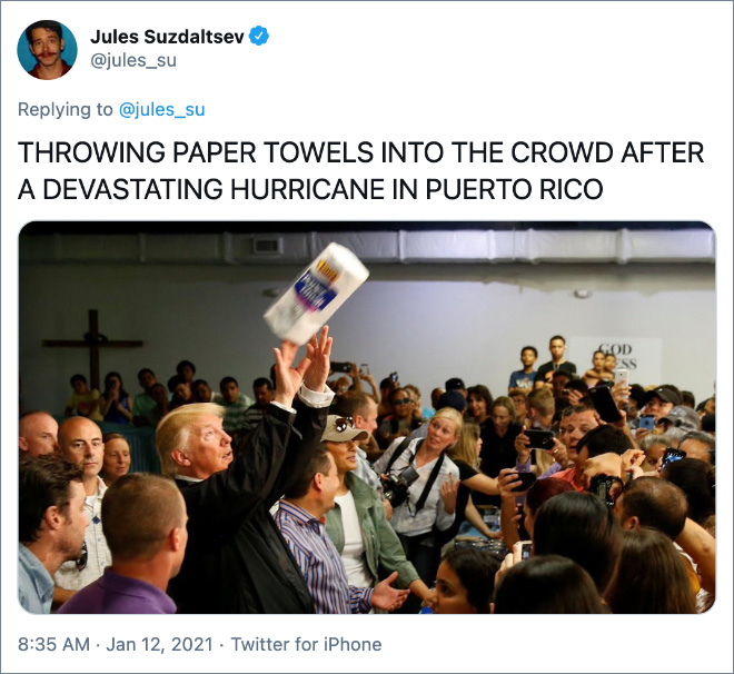 THROWING PAPER TOWELS INTO THE CROWD AFTER A DEVASTATING HURRICANE IN PUERTO RICO