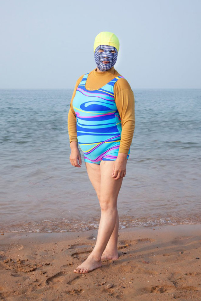Facekini swimsuits is a weird trend in China.